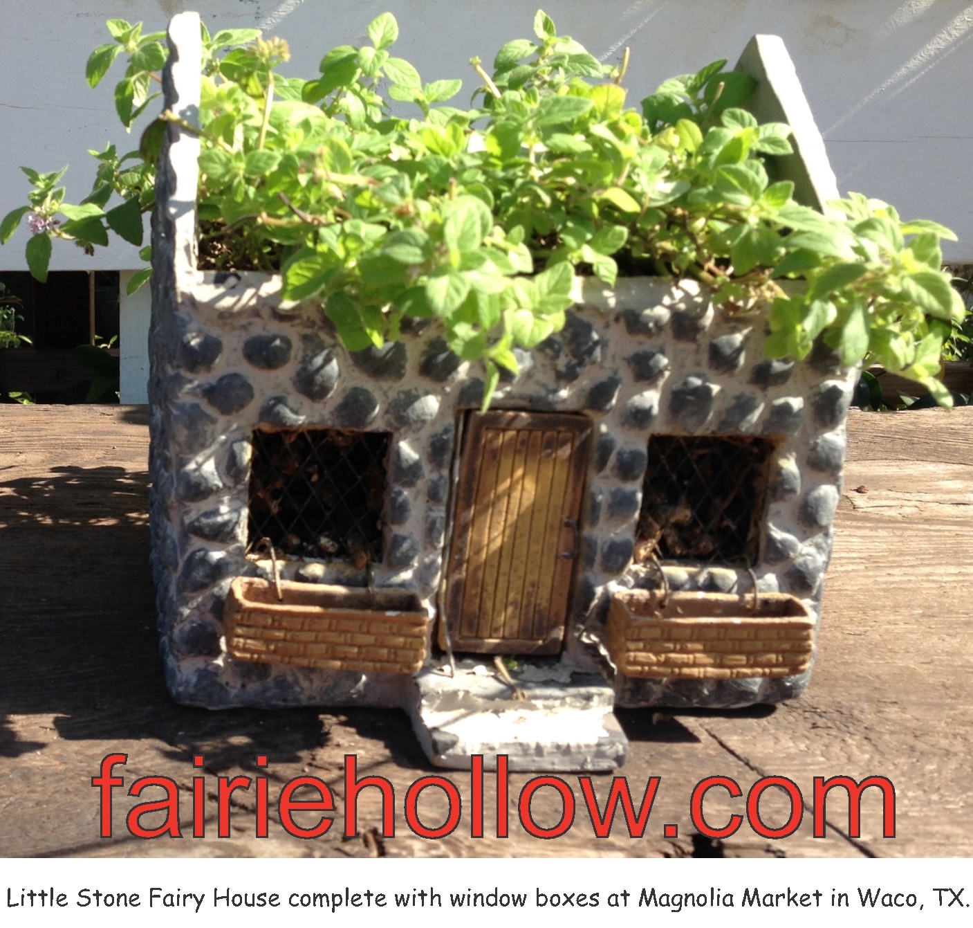 At Magnolia-Market in Waco, Texas, in their fairy garden was a stone fairy house with a planted roof | fairiehollow.com