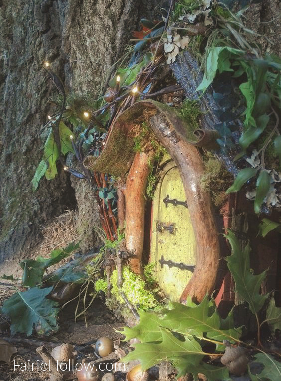 Green fairy door in tree house